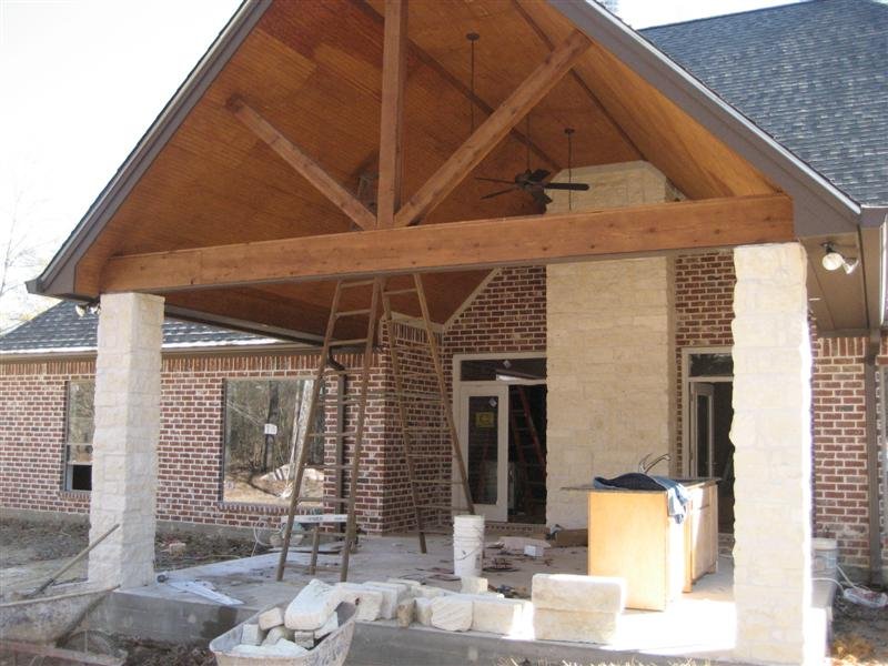 Custom Rustic Cedar Beams and Back Porch with Stone 